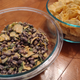 Meal of black bean salad and chips